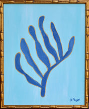 Load image into Gallery viewer, Navy Blue seaweed shape outlined in gold on light blue background. This preppy vertical painting is in a gold bamboo frame. Signed by the artist on the front. based on Matisse&#39;s famous cut outs.
