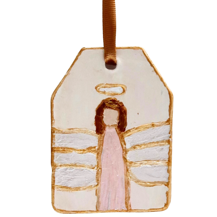 Fun angel ornament. This vertical angel ornament features an abstract angel with a pink dress, white wings, brown hair and gold a halo oultined in gold paint. The edges is also outlined in gold and comes with a gold ribbon.