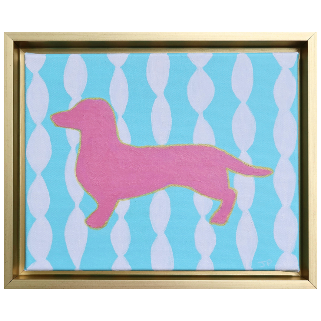 Colorful pop art dog painting on canvas. This painting has a pink dachshund silhouette on a funky blue and white background. It is in a gold float frame and is horizontal.