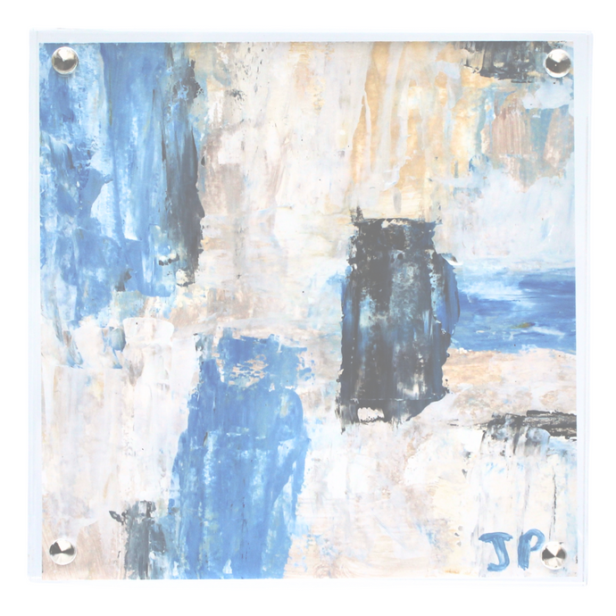 square abstract painting on paper in an acrylic frame. This painting has shades of blue, black gray white, yellow and tan. It is initailed by the artist on the front. 