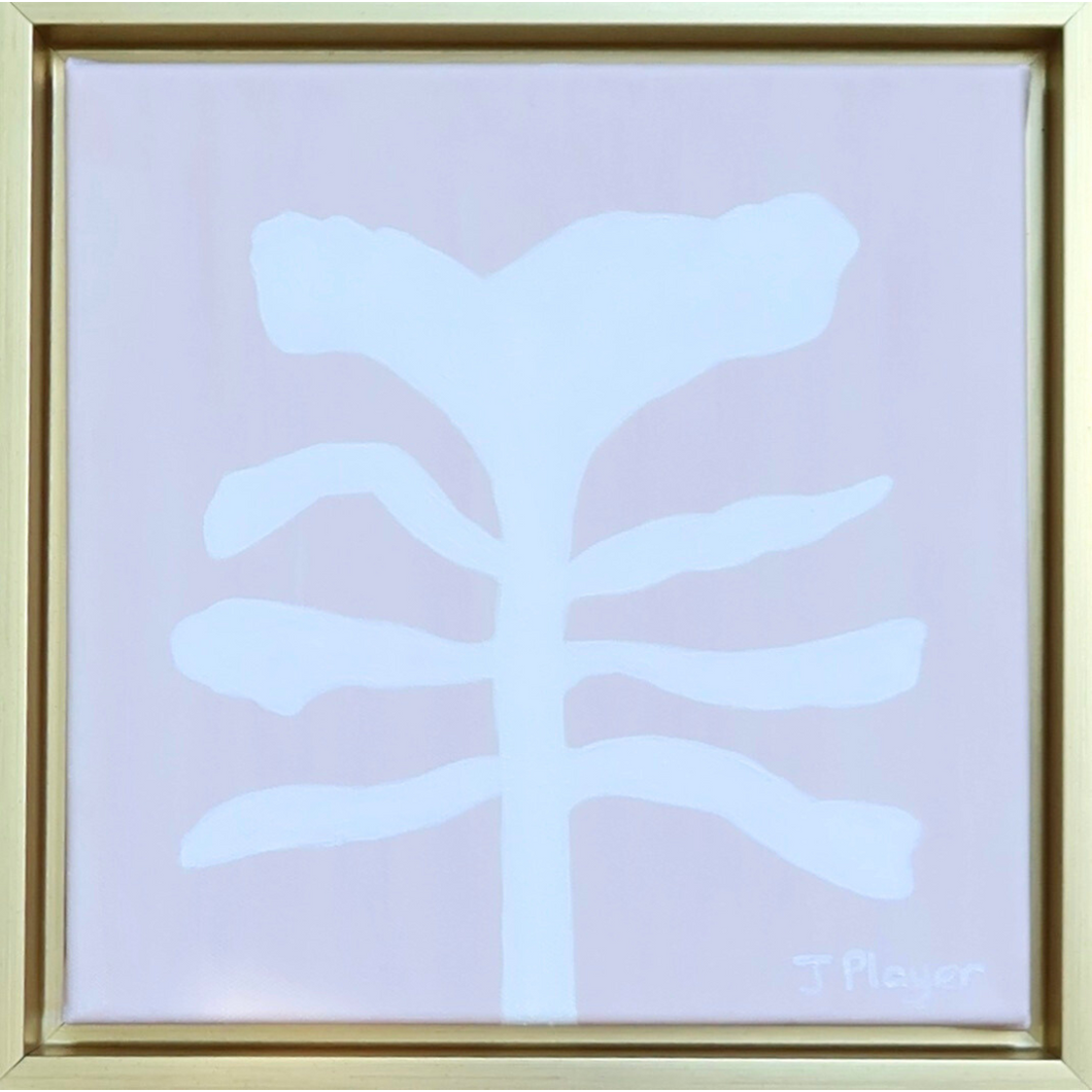 Modern white floral silhouette on a blush pink background. it is sqaure in shape and signed by the artisti on the front. It comes in a gold float frame.