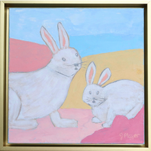 Load image into Gallery viewer, Colorful bunny painting on canvas. This painting has two cute rabbits looking towards the viewer. The rabbits have shades of white, tan, gray with pink ears on an abstract backround of pink, coral, magenta, yellow and blue. This is a square painting Signed by the artist on the front. Colorful whimsical bunny painting on canvas in a gold float frame. Original Easter and nursery artwork by Jeanne Player Fine Art.