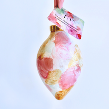 Load image into Gallery viewer, Abstract Christmas Ornament. Hand painted original ornament with shades of pink, white and gold. This original work of art has a pink ribbon.