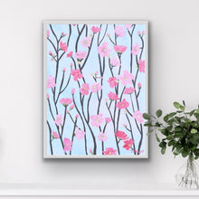 Load image into Gallery viewer, Cherry Blossom abstract floral giclée art print by Jeanne Player featuring pink, blue, green, and yellow brushstrokes with a white border. Available in 9x12 and 18x24 sizes, perfect for living rooms, bedrooms, dorms, or nurseries.