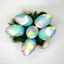 Load image into Gallery viewer, Original colorful hand painted easter egg on wood. The eggs have shades of green, blue, yellow, pink, purple and white with gold outlines.