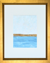 Load image into Gallery viewer, Golden Blue is a modern coastal inspired mixed media artwork. It has shades of blue and white with gold leaf in the middle and an optional gold frame. It has a white mat and fits an 11 x 14 inch frame.