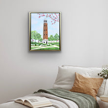 Load image into Gallery viewer, Framed Denny Chimes original artwork showcasing the famous University of Alabama landmark surrounded by flowering trees, green lawns, and winding campus walkways.