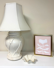 Load image into Gallery viewer, Soft and feminine white flower painting with a soft pink background in a gold frame. Perfect for traditional and grandmilleniall interiors.