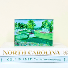 Load image into Gallery viewer, Freestanding acrylic block art featuring a colorful painting of Pinehurst No. 2 golf course with lush greens and elegant fairways, created by Jeanne Player Fine Art.