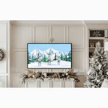 Load image into Gallery viewer, Winter Wonderland Digital Download for TV. This is a snowy winter scene with 3 deer, standing in the snow with evergreen trees and mountains in the background. Snow is falling all around. This artwork has shades of blue, green, white, tan, and gray.