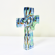 Load image into Gallery viewer, Abstract floral cross artwork mounted on a clear acrylic block with soft blue, green, white, and gold tones for elegant Christian decor.