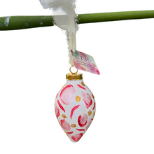 Load image into Gallery viewer, Original ceramic holiday ornament with blush pink, rosy red, and metallic gold animal print design.
Luxury hand-painted Christmas ornament perfect for pink Christmas trees, grandmillennial décor, and festive home styling.
Artist-designed pink animal print ornament with an adjustable cream raw silk ribbon and original painted finish.
Collectible ceramic Christmas ornament featuring bold pink animal print artwork, signed by Jeanne Player and ready for gifting.