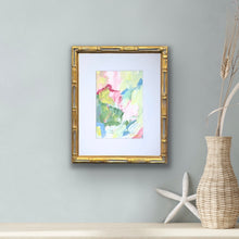 Load image into Gallery viewer, Grandmillennial abstracct artwork with vibrant shades of pink, blue, yellow, green and white, perfect for collected interiors. This artwork has a white mat and comes in a gold bamboo frame.
