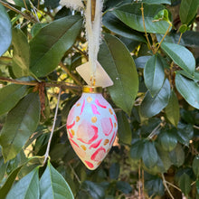 Load image into Gallery viewer, Elegant ceramic Christmas ornament with abstract pink leopard spots and shimmering gold details.
Preppy pink Christmas ornament featuring hand-painted animal print artwork for stylish holiday decorating.