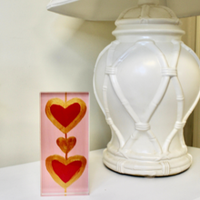 Load image into Gallery viewer, Pink heart shelf decor featuring Heartstrings XIII by Jeanne Player Fine Art, a modern acrylic block art piece with a romantic design and elegant contemporary style.