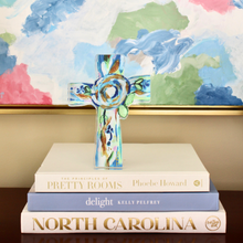 Load image into Gallery viewer, Modern Christian acrylic shelf sitter with layered blue and green floral cross artwork reproduced from an original painting by Jeanne Player.