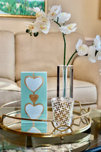Load image into Gallery viewer, Hand-painted blue heart artwork with modern pop art style and sophisticated coastal aesthetic.
Whimsical turquoise and blue heart painting by Jeanne Player for stylish collected interiors.