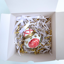 Load image into Gallery viewer, Artisan-painted finial ornament with pink and red floral design wrapped around the entire ornament for beauty from every angle.
Hand-painted floral holiday ornament with metallic gold dots, soft green leaves, and feminine pink Christmas décor.