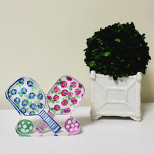 Load image into Gallery viewer, Freestanding pickleball acrylic block featuring a colorful floral paddle design in shades of pink, rose, blue, green, and white.