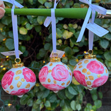 Load image into Gallery viewer, Original Christmas ornament with romantic pink flowers and gold highlights, perfect for holiday décor and gift giving.
Hand-painted pink floral ceramic keepsake ornament by Jeanne Player designed for elegant Christmas decorating.