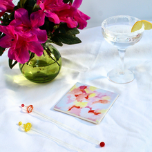 Load image into Gallery viewer, Colorful ceramic coaster set featuring abstract pink, coral, peach, and orange artwork by Jeanne Player with cork backing, perfect for colorful home décor.
