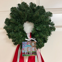 Load image into Gallery viewer, Carolina blue UNC acrylic ornament designed from original Old Well artwork for elegant college holiday decor. You can hang this ornament on a tree or wreath.