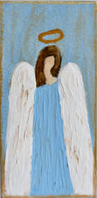 Load image into Gallery viewer, A vertical shelf sitter with an abstract angel painting. The angel is blue with with wings, brown hair and a gold halo. The background has shades of blue. The edge on the painting is outlined in gold.