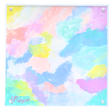 Load image into Gallery viewer,  A colorful abstract painting on paper in a square acrylic frame. This painting has shades of blue, green, yellow, pink, fuchsia, orange and white. It is signed by the artist on the front. 
