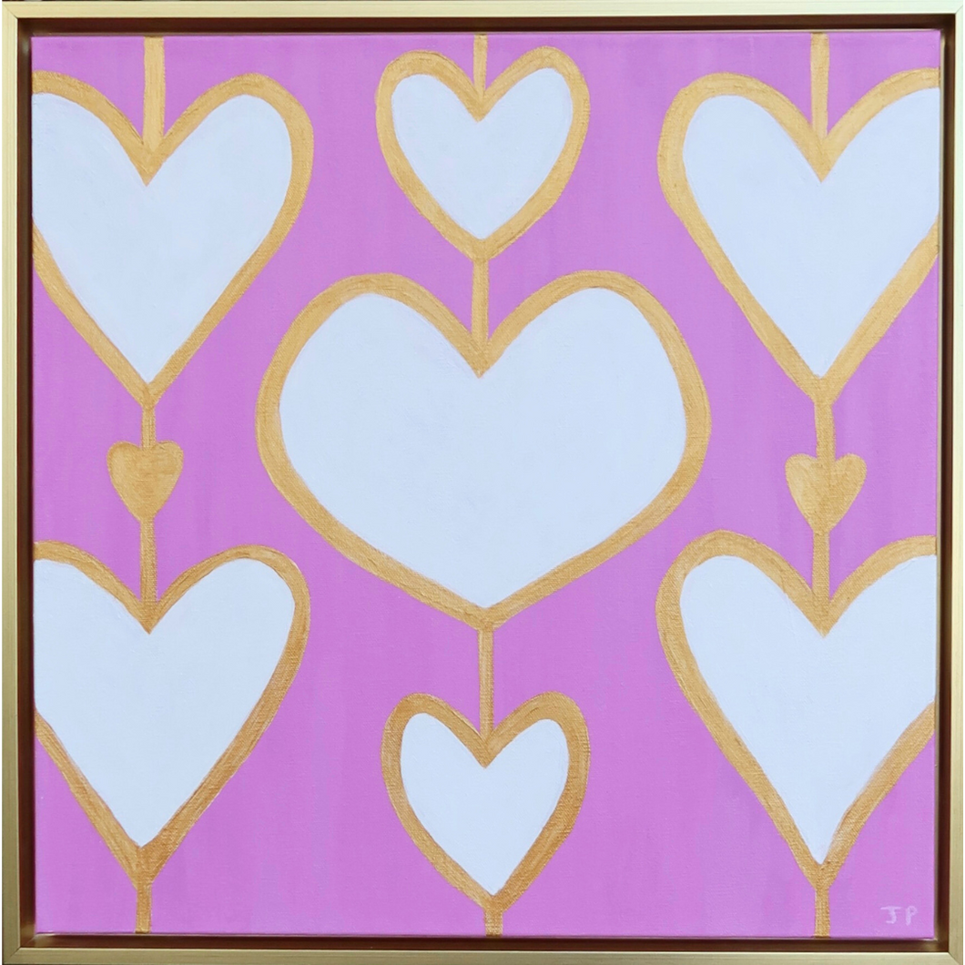A bold pink heart painting on canvas. This painting has 7 white hearts  outlined with gold on a pink background. It is a square painting on canvas and comes in a gold float frame. This will make a happy and fun statement to your room. It is a part of the Heartstrings Collection.