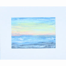 Load image into Gallery viewer, Beach Sunset is an abstract landscape painting on paper. This coastal inspired painting has shades of gray, blue, yellow, orange,  and white. It is in a white mat. It is a horizontal painting.
