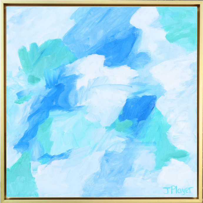 Blue Lagoon is a coastal inspired abstract painting on canvas with shades of blue, green and white. It is in a gold float frame. It is square painting on canvas.