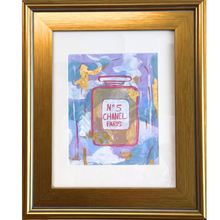 Load image into Gallery viewer, This is an abstract artwork on paper. It is a painting of a chanel perfume bottle in shades of purple, blue, white, gold and pink. It also has gold leaf. It is shown in a gold plein aire frame.
