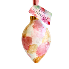 Load image into Gallery viewer, Hand-painted ceramic finial Christmas ornament featuring abstract blush pink, white, and metallic gold artwork by Jeanne Player.
Original ceramic Christmas ornament in an elegant finial shape with pink and gold abstract painted design.
