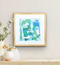 Load image into Gallery viewer, This is a square colorful abstract artwork on paper. It has shades of green,blue, white and pink. It is signed by the artist on the front.
