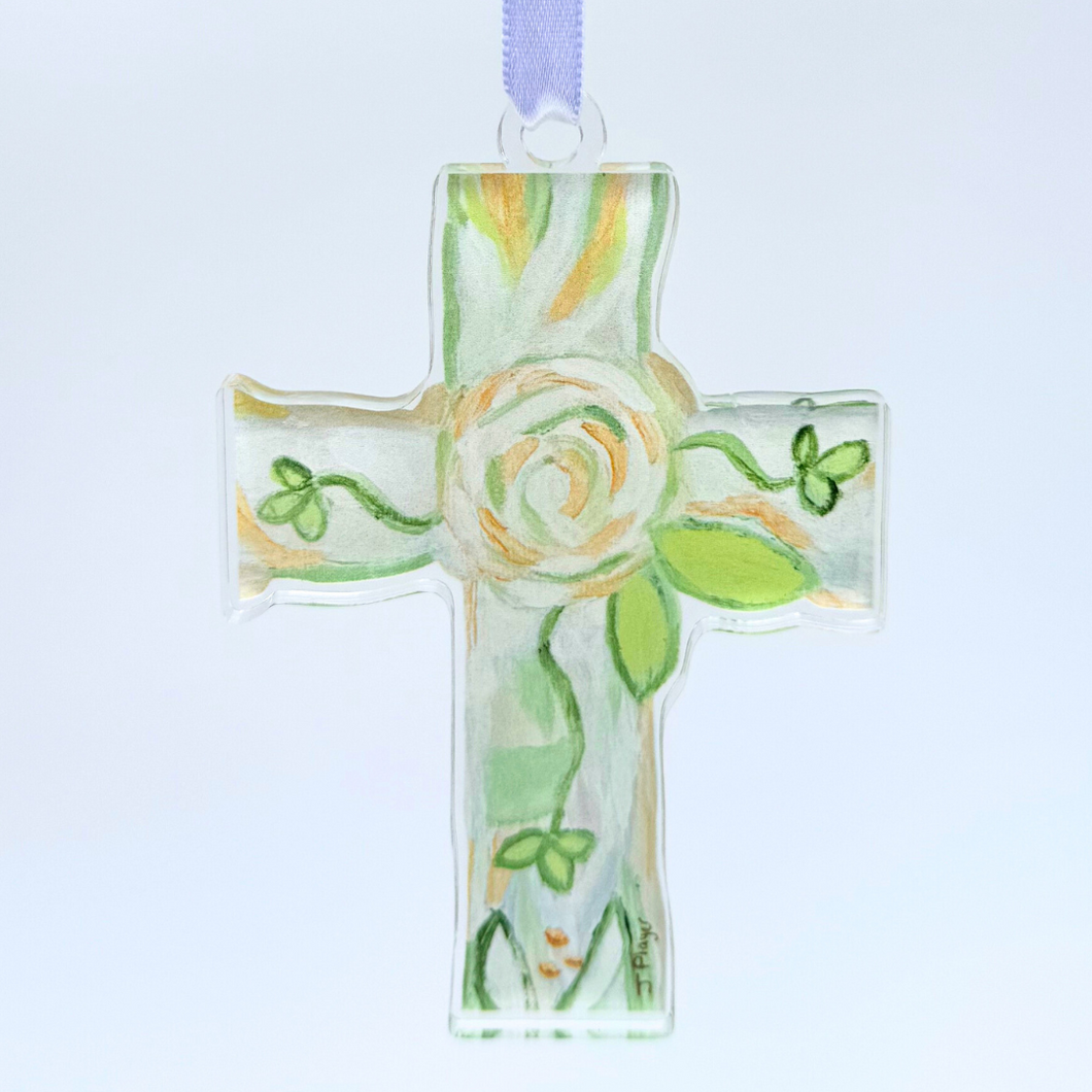 This is the faith cross, it has a green, white and gold floral design, a cross cut out shape, made for high quality acrylic. it is lighweight and shatterproof. It comes with a satin ribbon.