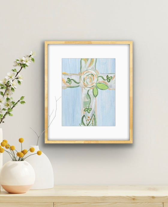 beautiful modern Christian cross art print. This is a vertical print on paper. It has neutral colors on a blue background..