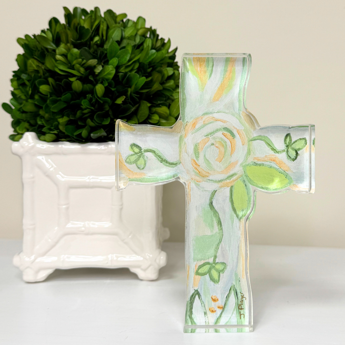 This is a green, white and gold abstract floral christian cross. It is a cutout acrylic block. It is freestanding and looks great on tabletops, desk, bookcases and more. A wonderful gift idea for baby showers, weddings, baptisms, christenings, Easter and Christmas.