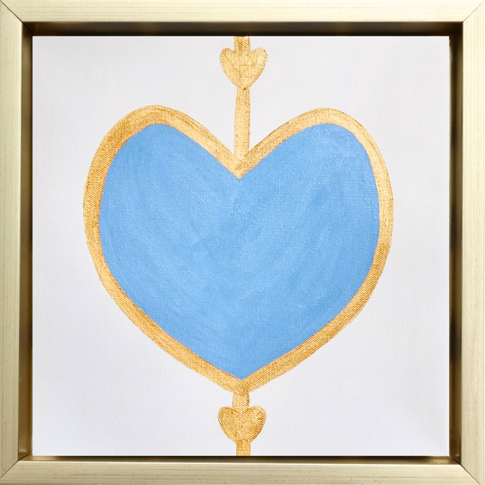 Bold Heart Painting. Blue heart outlined in gold with 2 smaller gold hearts on a square white canvas. This original artwork is in a gold float frame. 