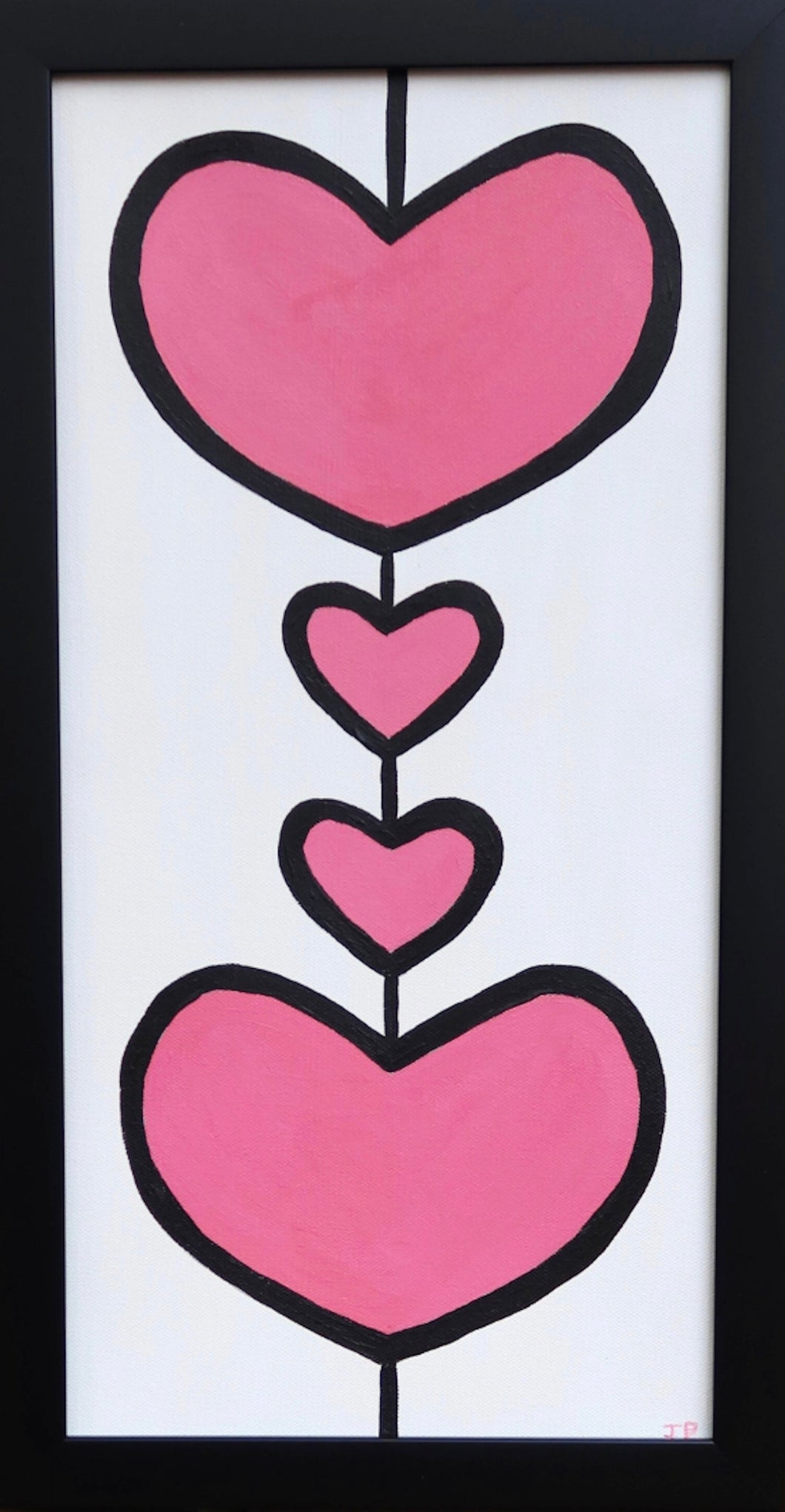Pink Hearts on Canvas outlined in black on a white background. There are 2 large hearts and 2 smaller ones. This is a vertical painting and is a black frame. Each heart can represent a family member. With this painting it would be a family of four.