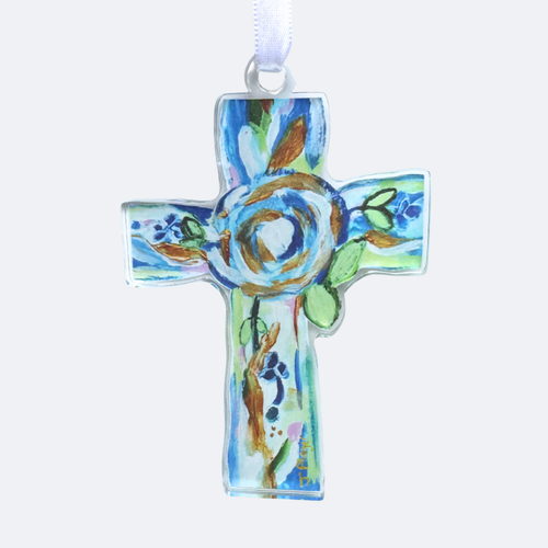 This is a Christian Cross Christmas ornament. It has shades of blue, green, white and gold. It is an acrylic cut out shape of a cross with a white satin riboon.