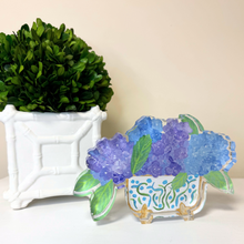 Load image into Gallery viewer, Colorful hydrangea floral acrylic block featuring painterly blue and purple blooms in a charming cachepot arrangement.
Freestanding floral acrylic décor block with hydrangea artwork designed to add whimsy and sophistication to shelves and desks.
Contemporary hydrangea acrylic art block featuring vibrant floral colors and modern Southern-inspired botanical style.
