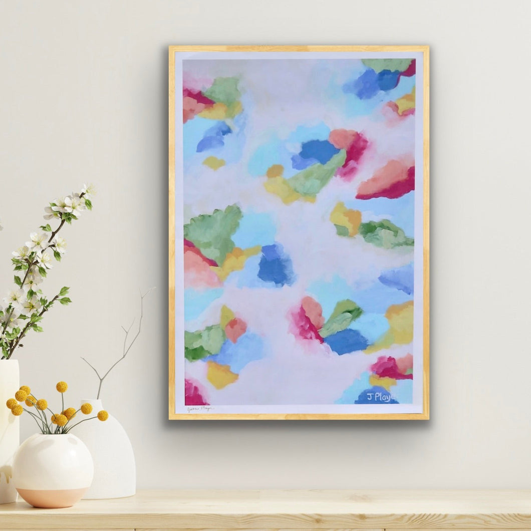 Jubilee abstract giclée art print with painterly brushstrokes in pink, coral, blue, green, yellow, and white. A 24x36 vertical fine art print by Jeanne Player, perfect for living rooms, dorm rooms, or nursery decor. Blends timeless sophistication with playful charm.