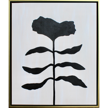 Load image into Gallery viewer, Modern bold Black flower silhouette on a white and tan canvas. This vertical painting is in a gold and black float frame. It is a part ot the monochrome botanical series.
