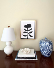 Load image into Gallery viewer, Black and white monochrome flower painting styled with a chinoiserie vase and  chanel books and a lamp.
