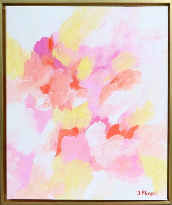 A colorful abstract painting on canvas. This artwork has shades of pink, fuchsia, yellow, coral, orange and white. It is a vertical painting in a gold float frame.