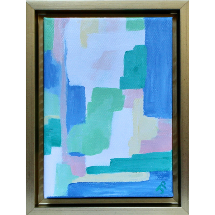 Vineyard is a vertical abstract artwork on canvas. This painting comes in a gold float frame. It has geometric shapes of blue, green, yellow, pink, and white.