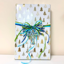 Load image into Gallery viewer, Blue and green Christian cross ornament displayed as meaningful Christmas holiday decor

