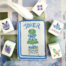 Load image into Gallery viewer, Blue mahjong Joker ornament with striped border and gold trim details on a mahjong mat.
