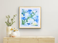 Load image into Gallery viewer, Abstract coastal print with flowing blue, white, green, and yellow brushstrokes creating a serene beach-inspired atmosphere.
