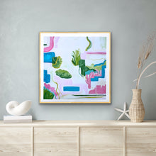 Load image into Gallery viewer, Square coastal abstract wall art in blue and pink displayed above a sofa in a bright beach-inspired living room.
